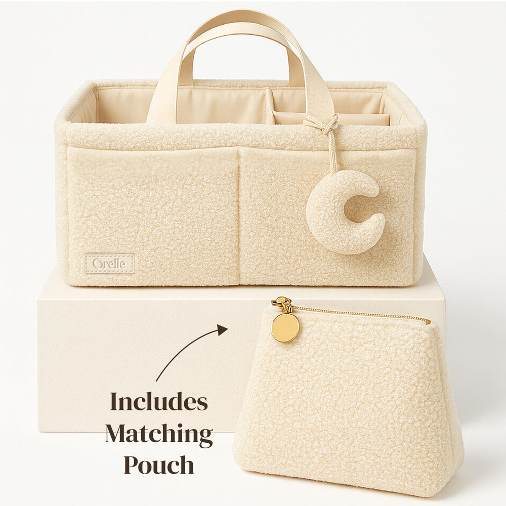 Orelle Diaper Caddy Matching Sherpa Pouch keeps wipes and creams within reach.