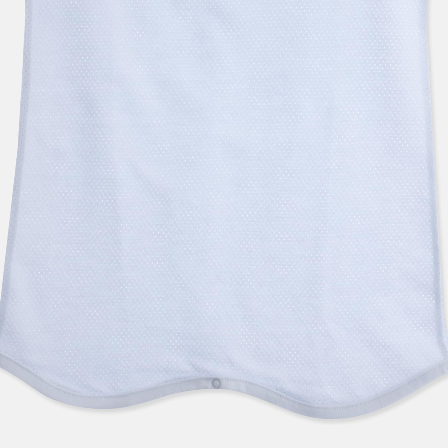 Tag-outside design on Organic Boom wearable blanket reduces skin irritation.