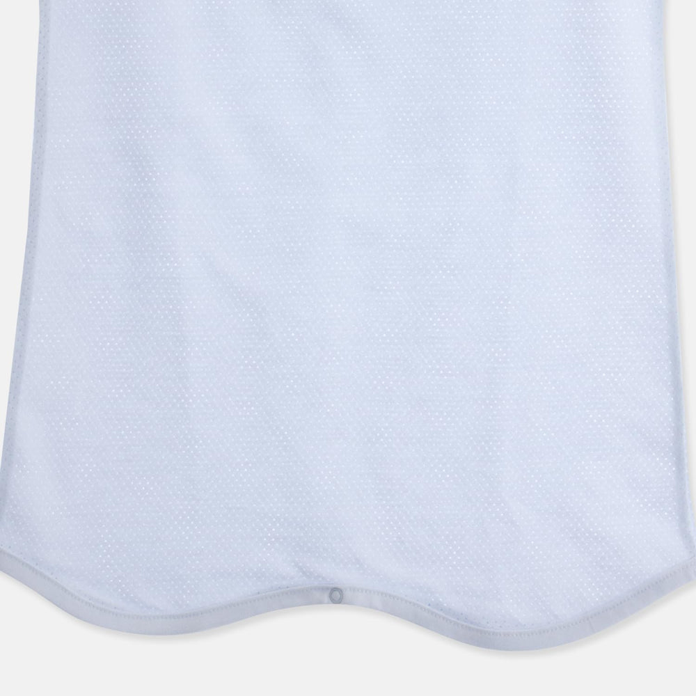 Tag-outside design on Organic Boom wearable blanket reduces skin irritation.