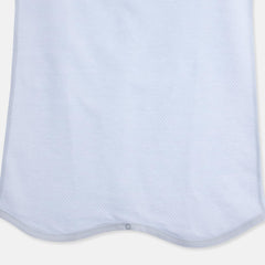 Tag-outside design on Organic Boom wearable blanket reduces skin irritation.