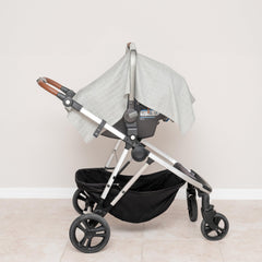 Organic Cotton Mart stroller cover doubles as shade on the go.