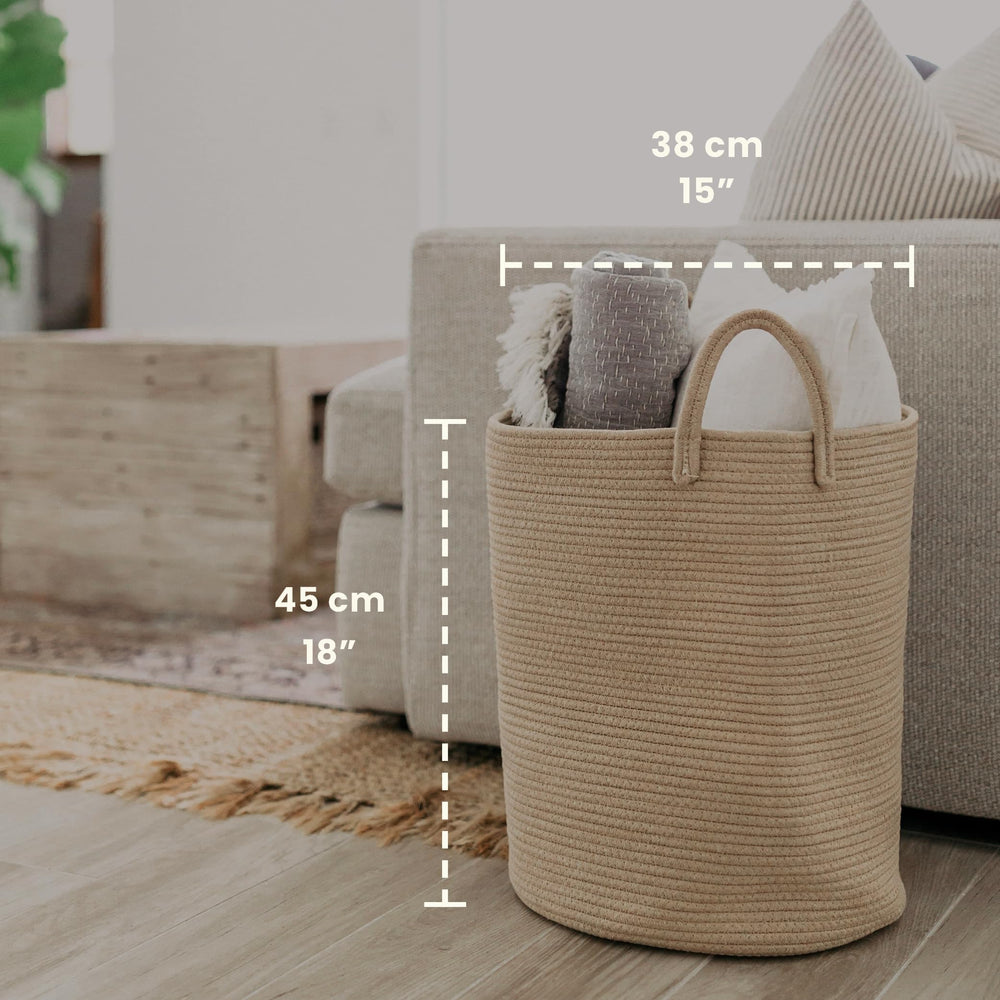 OrganiHaus honey off-white woven basket blends with decor and stores blankets