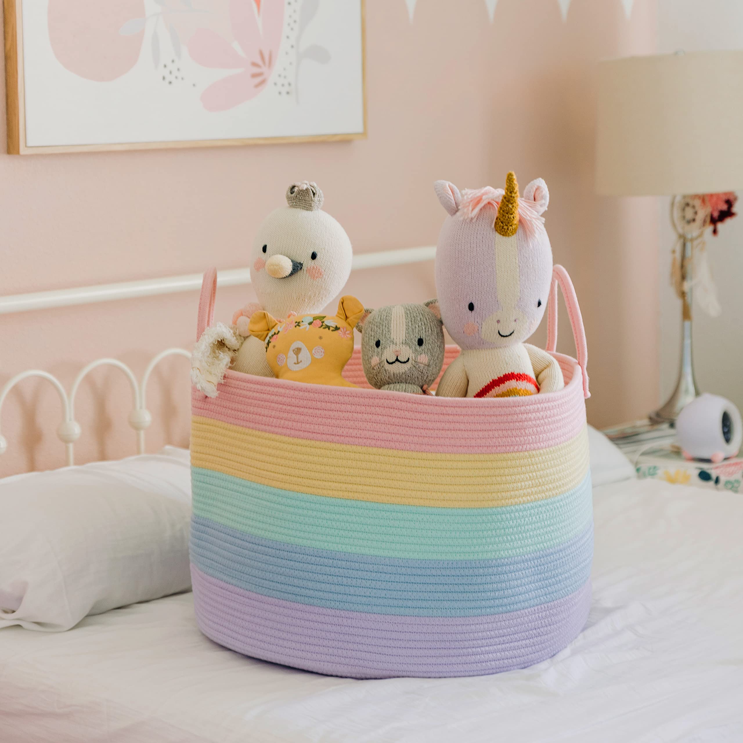 OrganiHaus rainbow bin keeps towels organized in the bathroom with soft materials