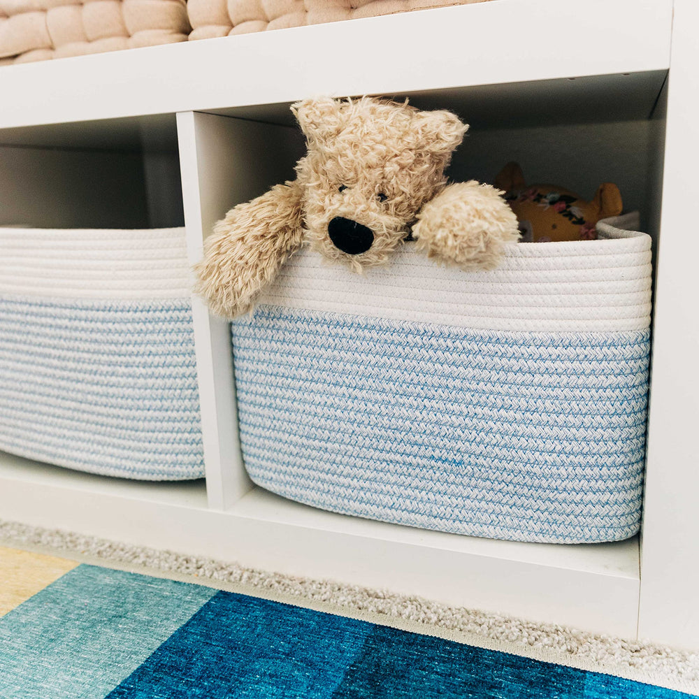 Blue/off-white basket adds minimalist style to shelves or bathrooms.