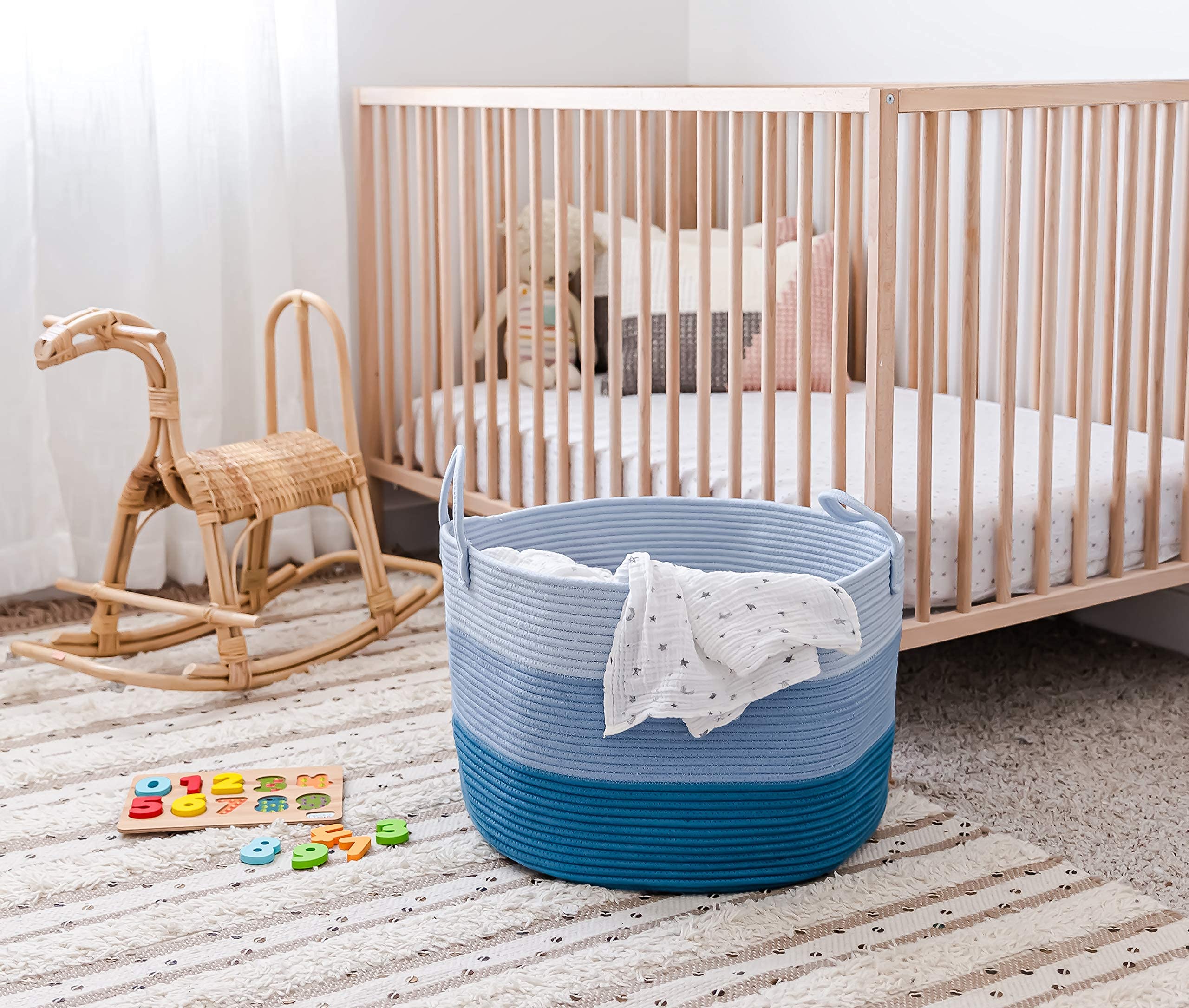 OrganiHaus foldable blue basket showing flexible, lightweight design.