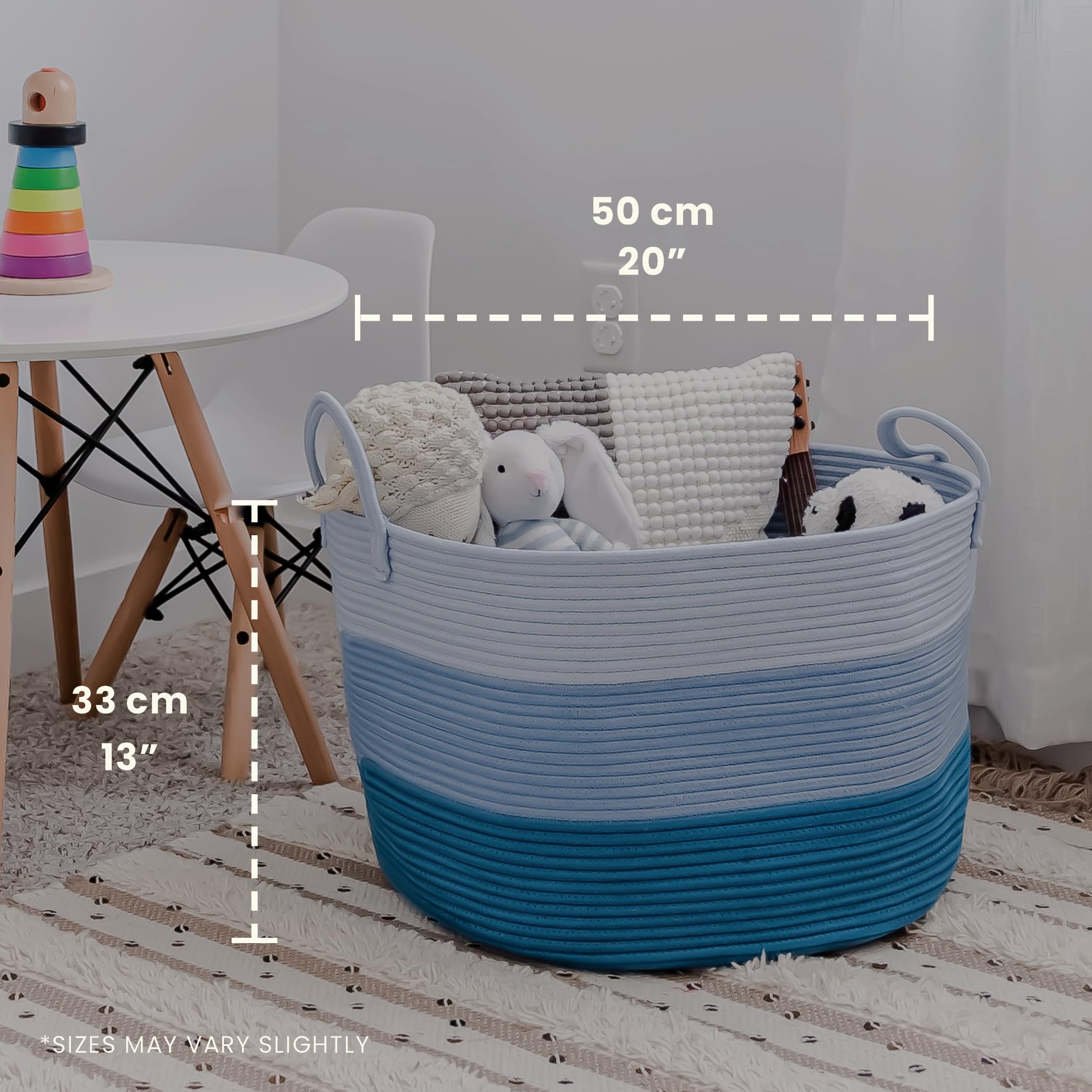 OrganiHaus blue basket with handles visible for easy room-to-room carrying.