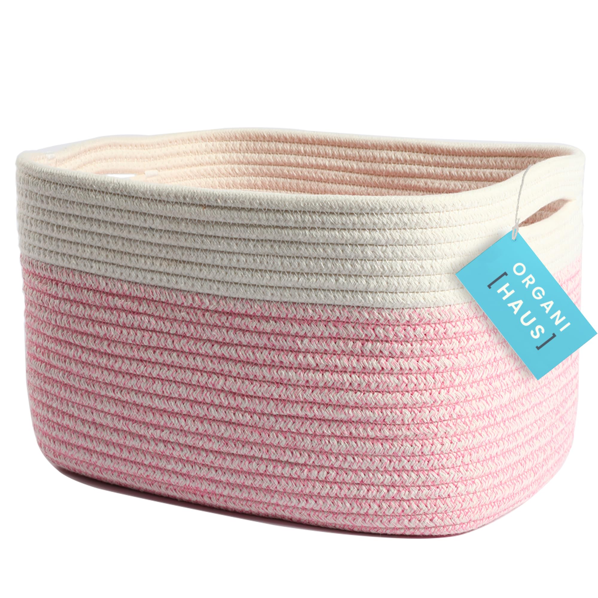 OrganiHaus woven storage basket in pink keeps shelves tidy and adds soft decorative charm.