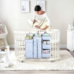 Orzbow baby organizer attached to changing table showcasing multiple pockets for supplies.