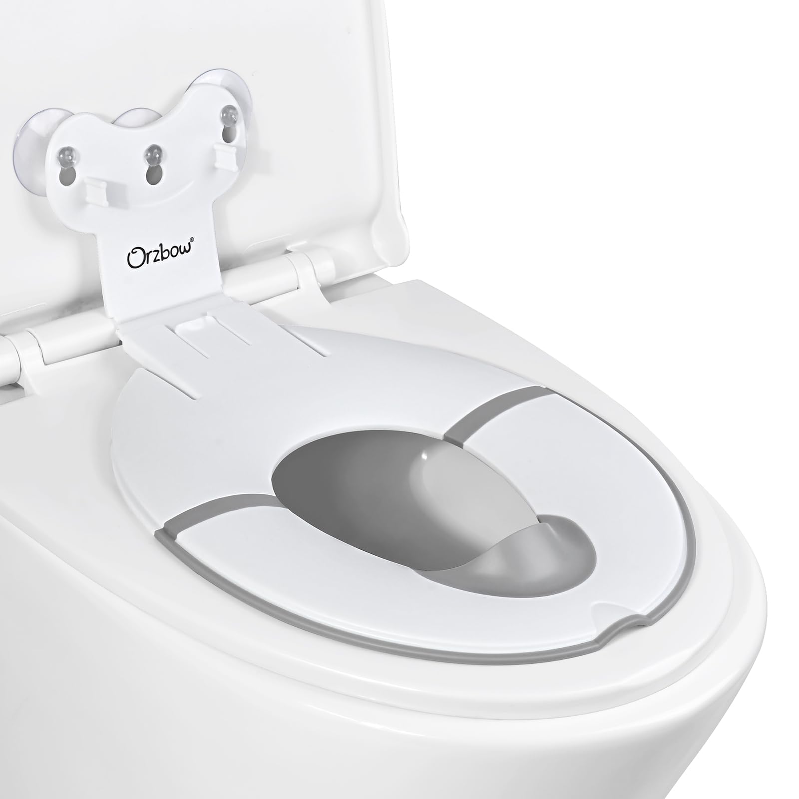 Orzbow foldable potty seat with suction cups securely attached to toilet lid.
