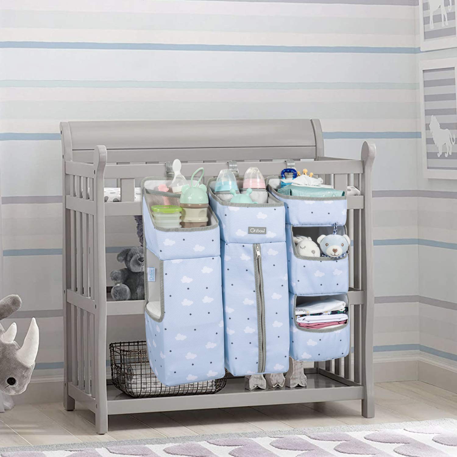 Orzbow hanging diaper organizer mounted on changing table.