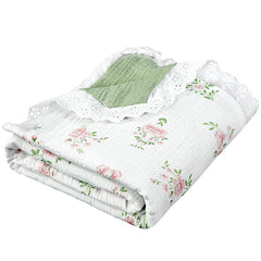 Oudain Flounce Muslin Blanket green side, breathable baby blanket for naps and cuddles.