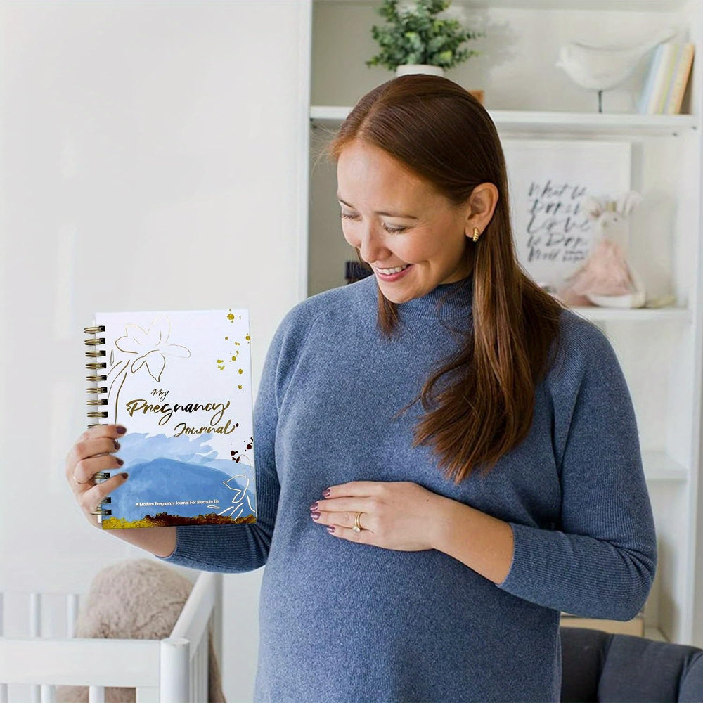 Ouhiam Pregnancy Journal gender-neutral design, refined gold accents for announcements.