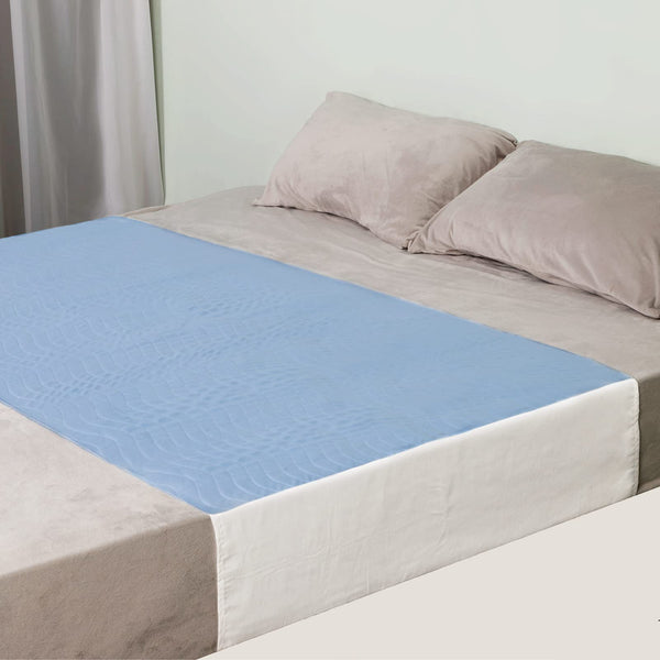 OUTCREATOR saddle-style bed pad top view showing tuck-in sides for secure fit.