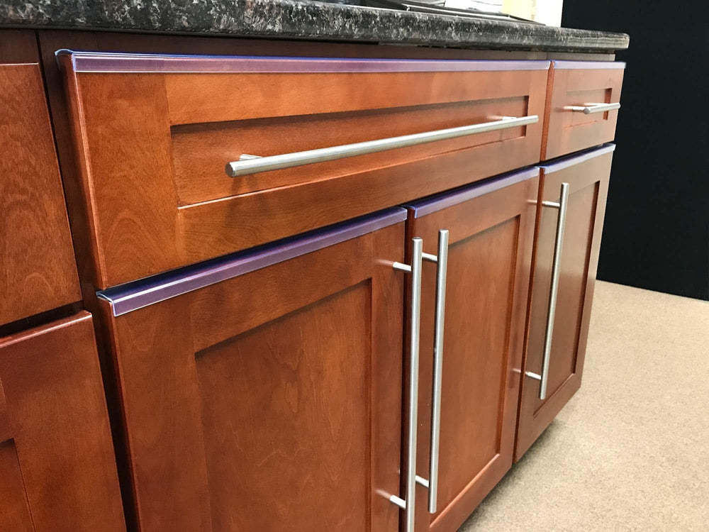 Outwater clear edge guard blends with wood or laminate on cabinets and drawers