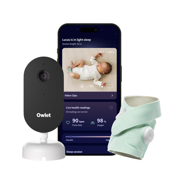 Owlet Dream Duo Gen 3 Dream Sock on baby for continuous oxygen and pulse insights.