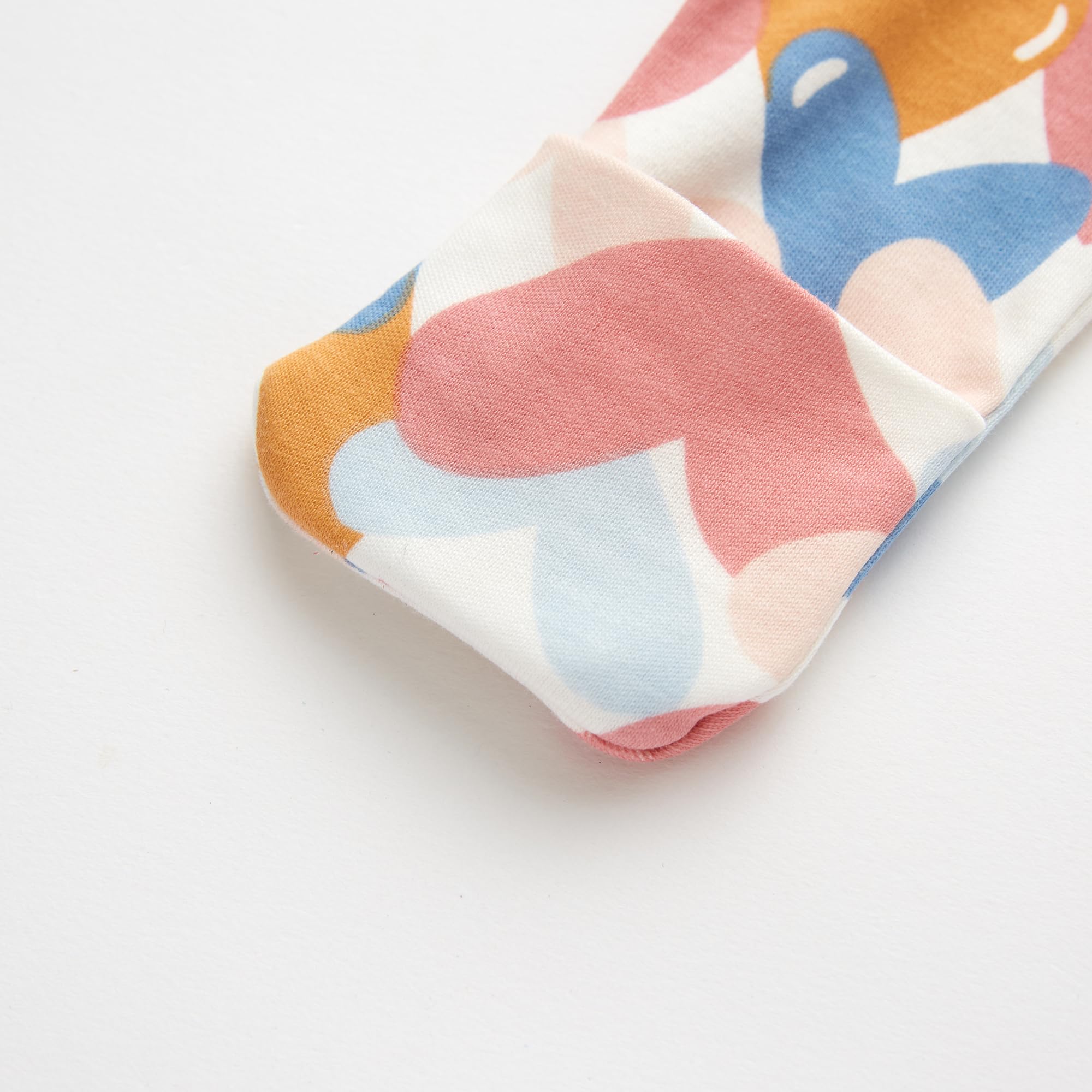 Owlivia newborn-sized long-sleeve sleepwear in organic cotton