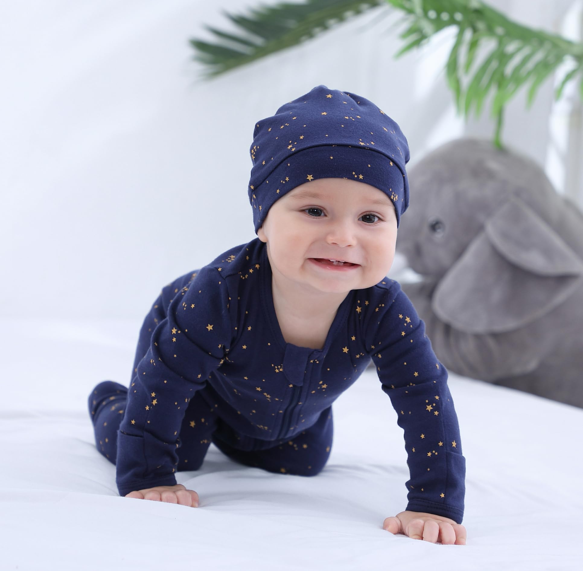 Owlivia footed sleeper keeps baby feet warm and secure