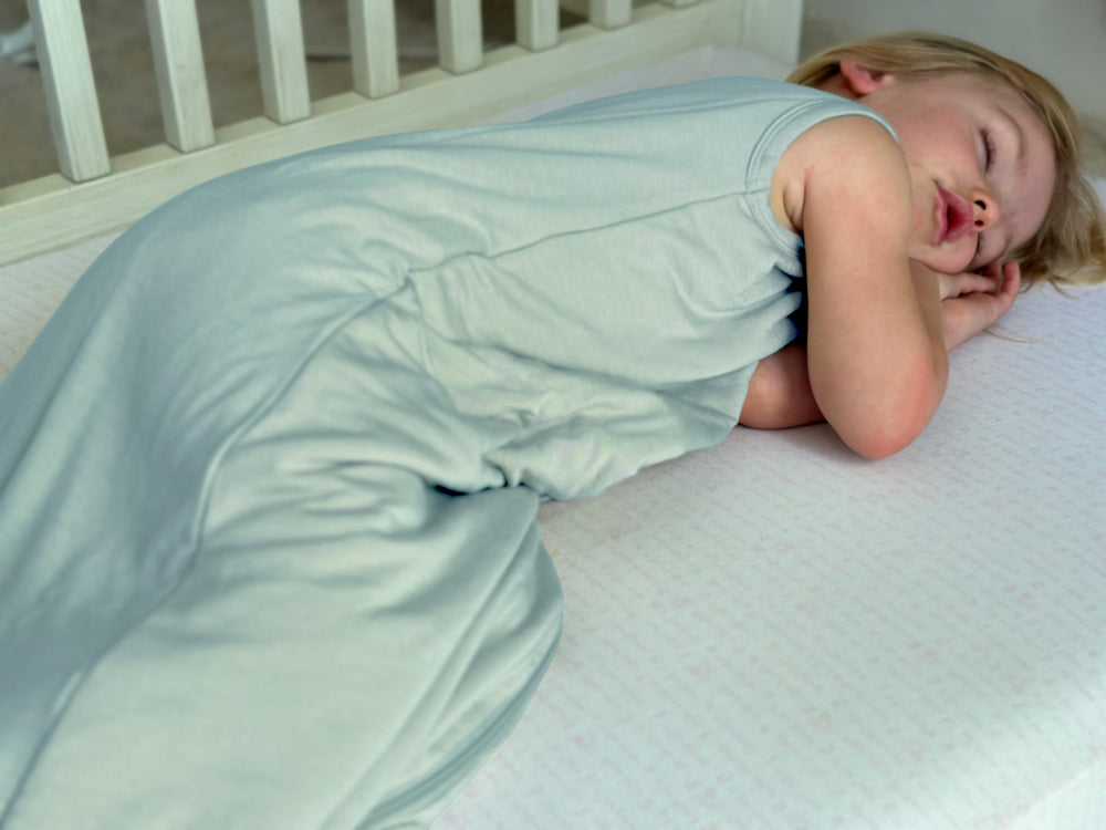Owlivia sleep sack labeled 1.0 TOG for comfortable year-round warmth.
