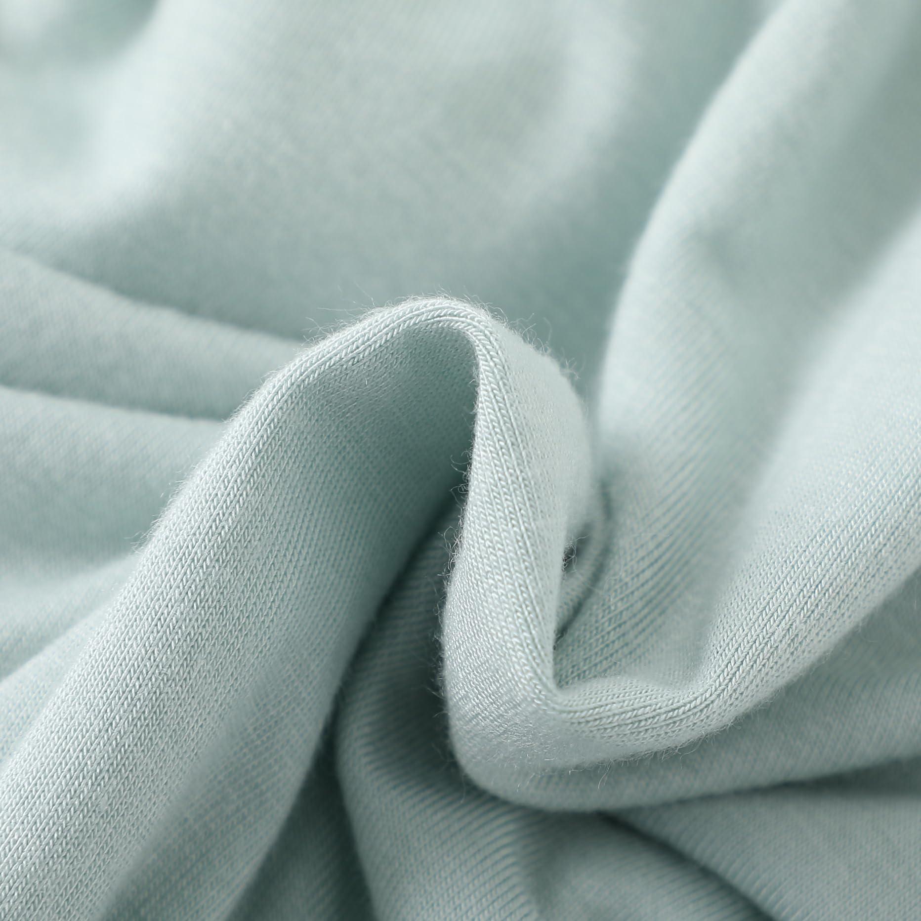 Owlivia swaddle transition design with quilted rayon layers for cozy support.