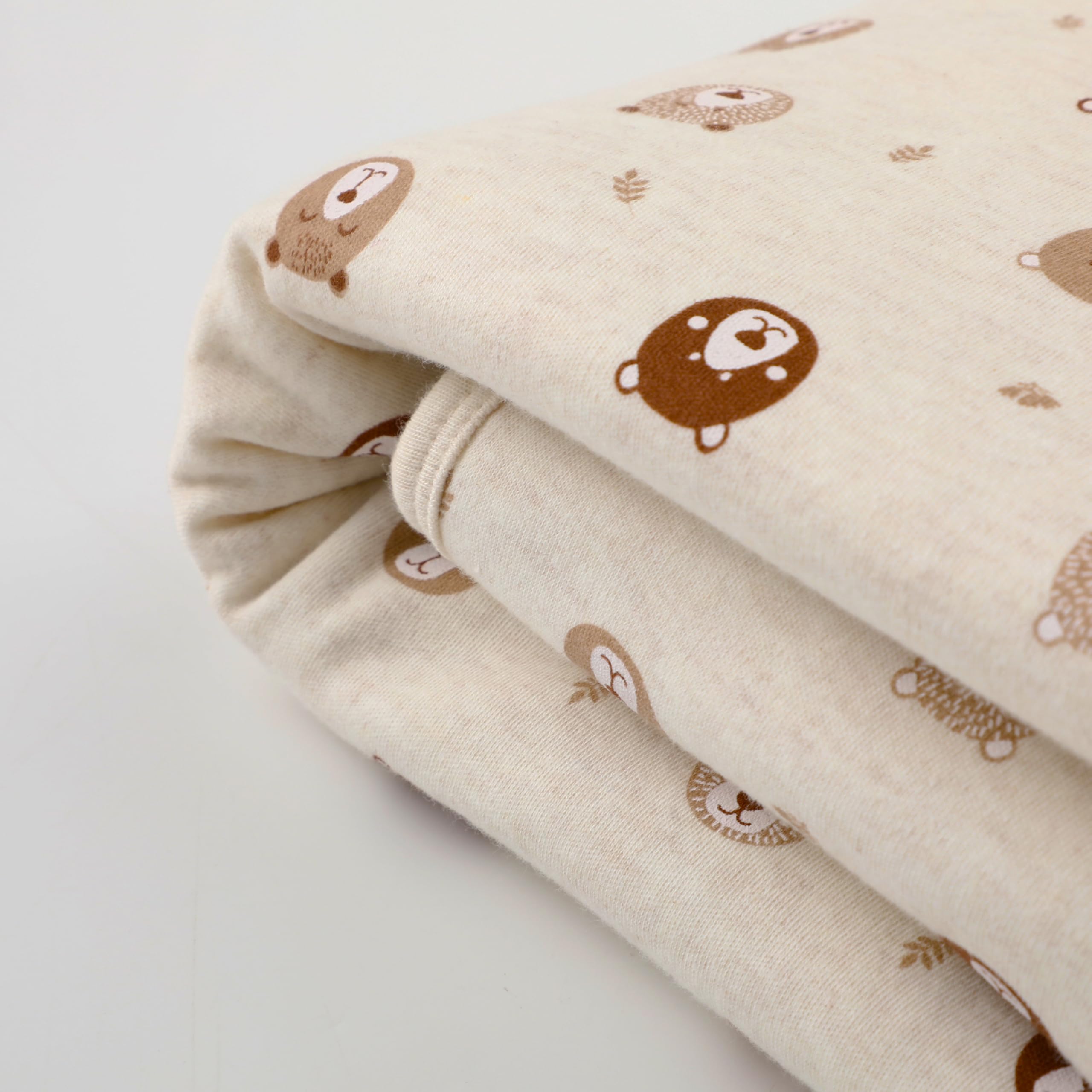 Owlivia reversible neutral blanket graphic print side adds playful nursery style.