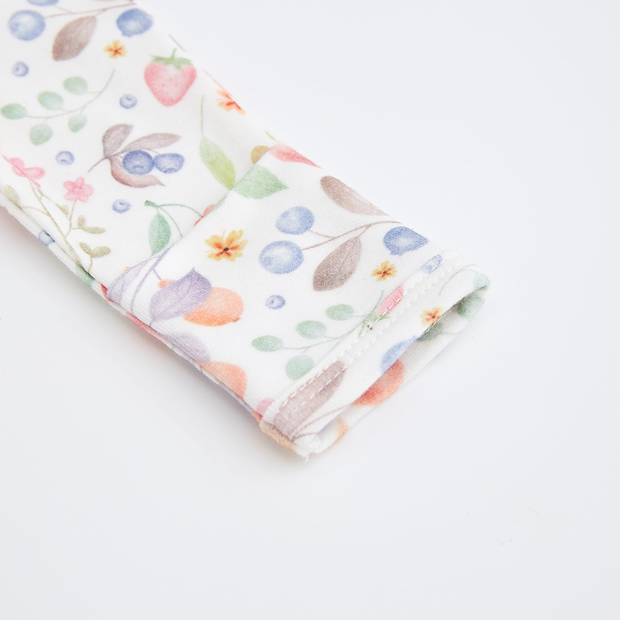 Owlivia Sleep 'N Play zipper closure facilitates gentle diaper changes.