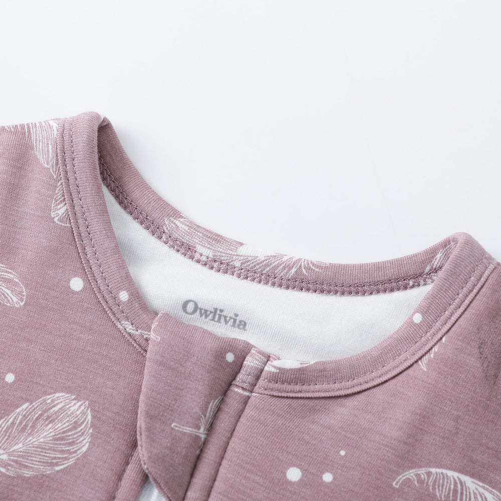 Owlivia sleep sack quilted two-layer fabric offers cozy warmth.
