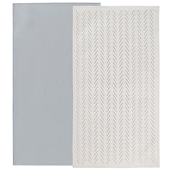Owlowla baby diaper changing pad in gray herringbone for gentle diaper changes