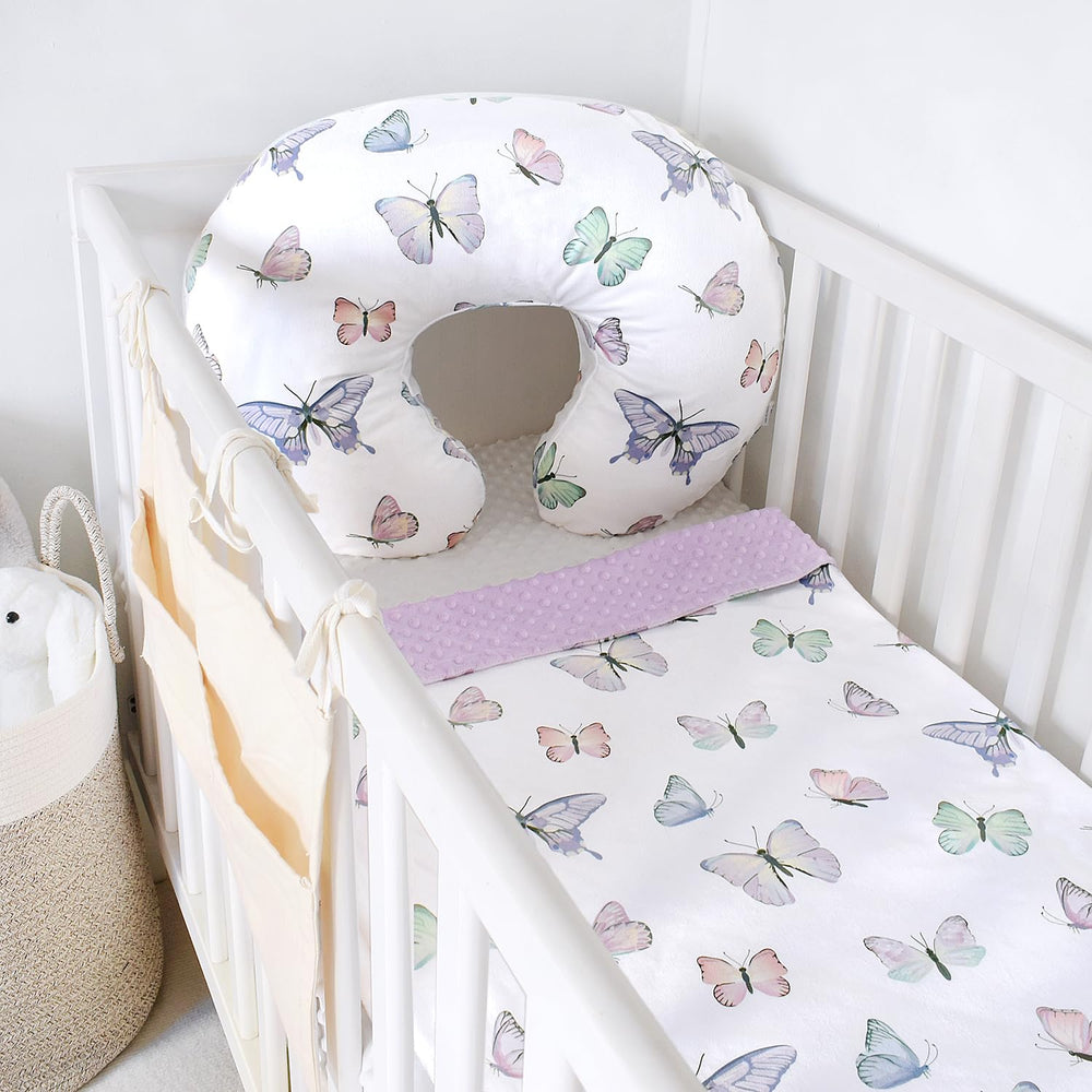 Owlowla Butterfly minky blanket on crib or toddler bed for extra warmth