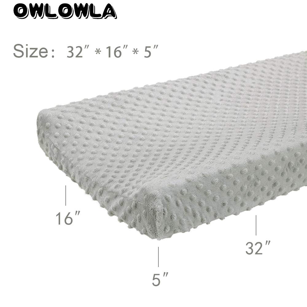 Owlowla changing pad cover adds a cozy touch to the baby nursery.