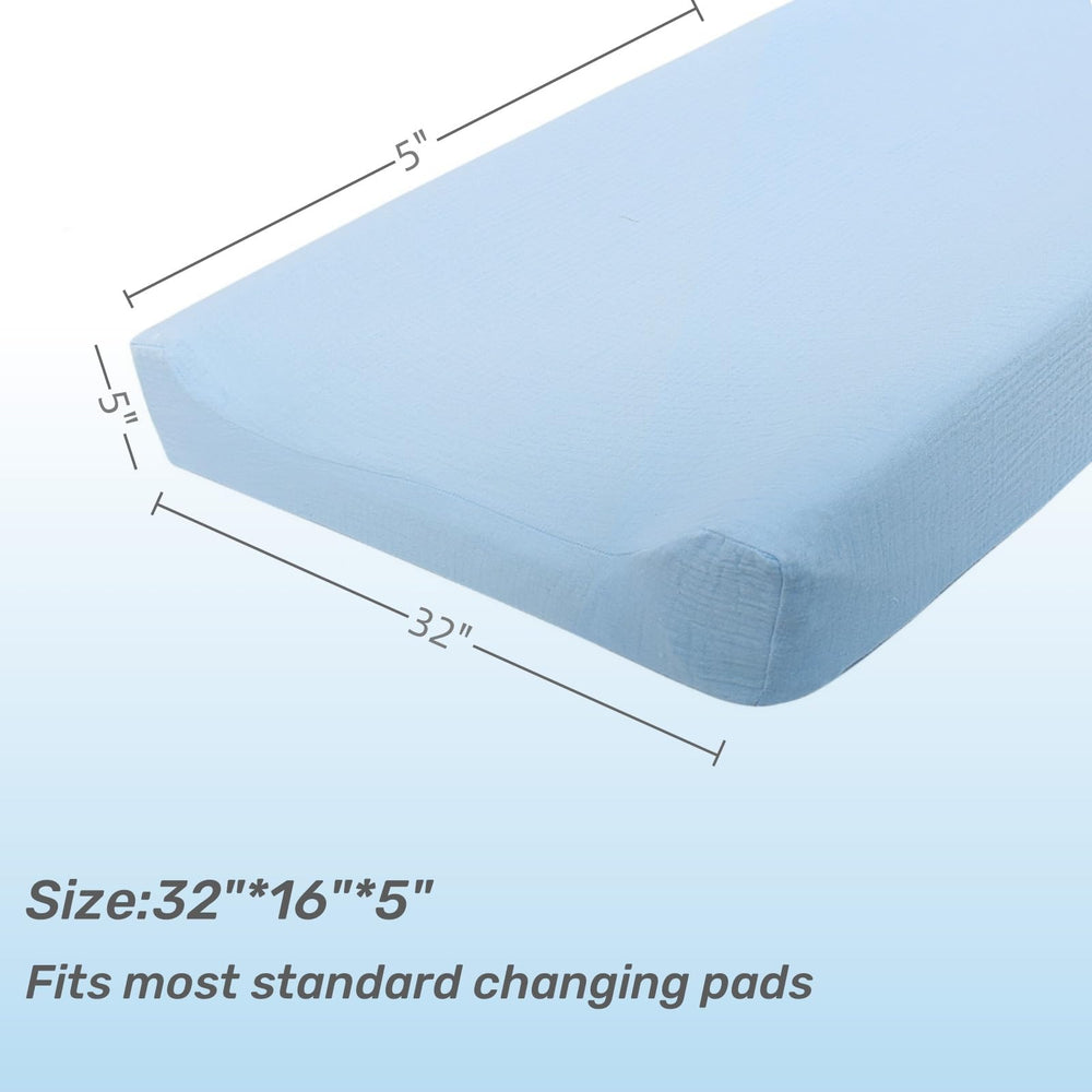 Owlowla muslin changing pad cover two-pack enhances nursery decor and hygiene.