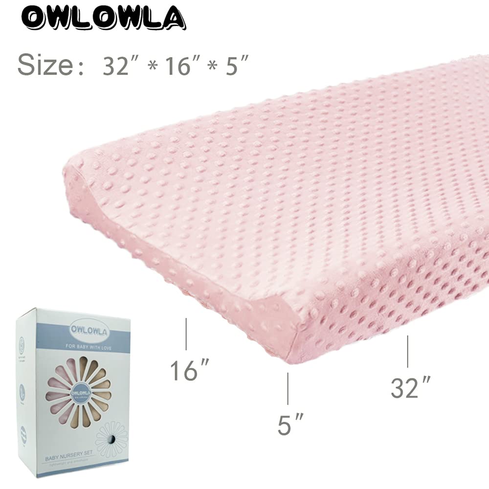 Owlowla nursery-friendly cover adds soft, comforting touch during changes.