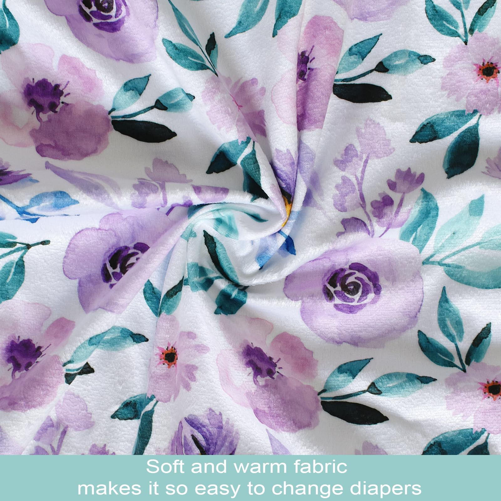 Owlowla waterproof changing pad cover with elastic bottom for secure fit on standard pads.