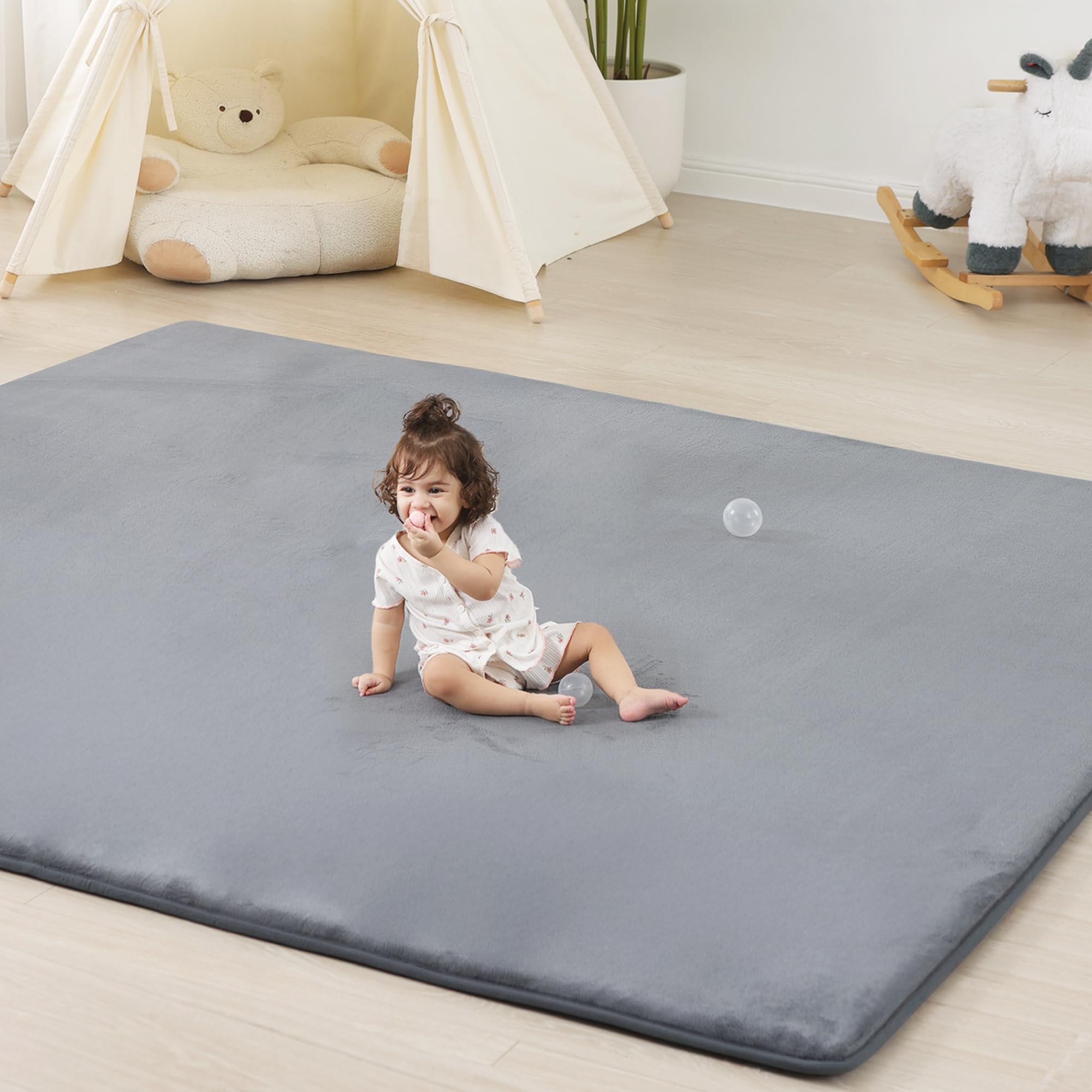 PaPaMat 1.3-inch thick cushioned foam mat ideal for crawling and tummy time.