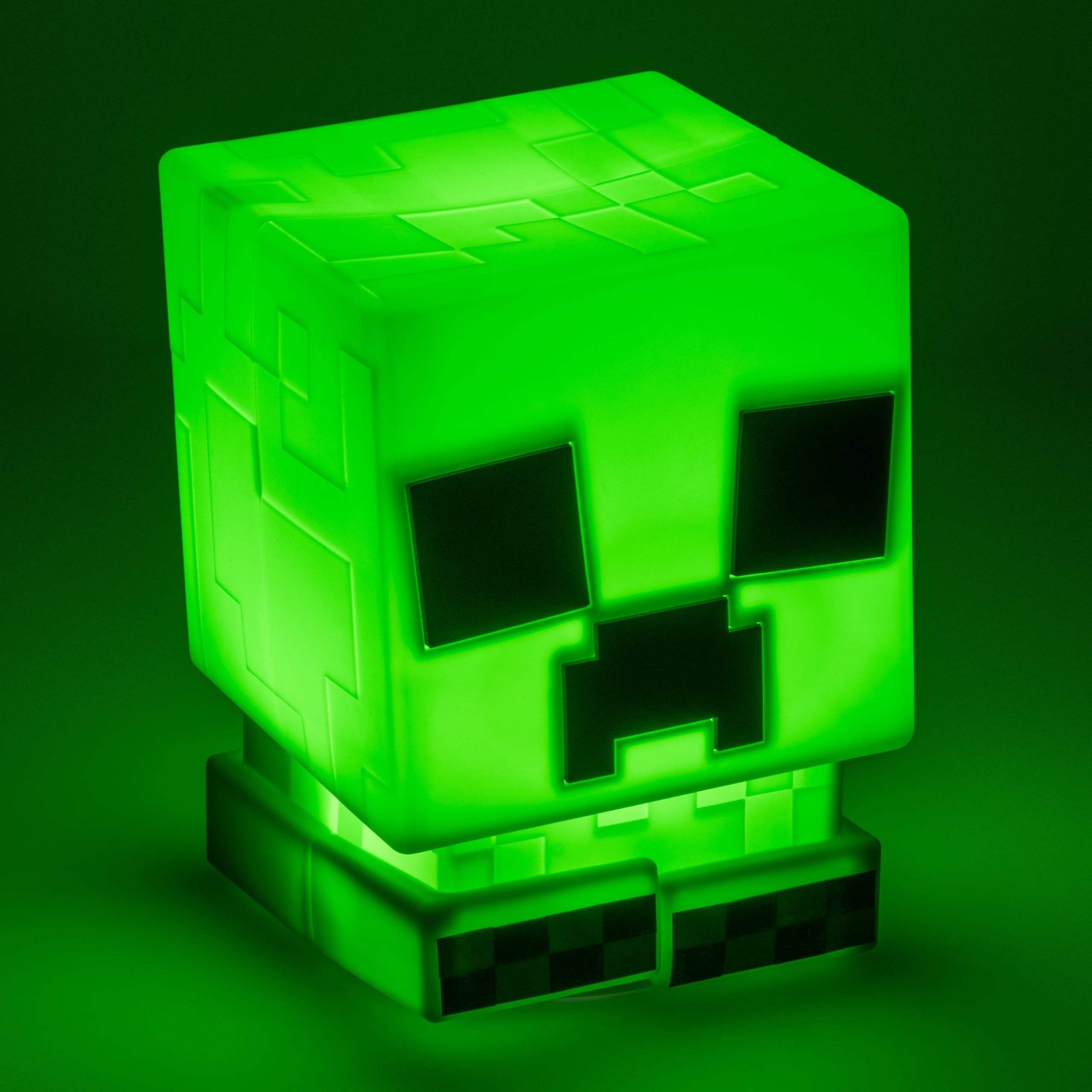 Close-up of Paladone Creeper SquishyGlo texture shows soft silicone feel.