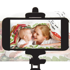 PAMBO multi-use blanket shown at the beach for family picnics