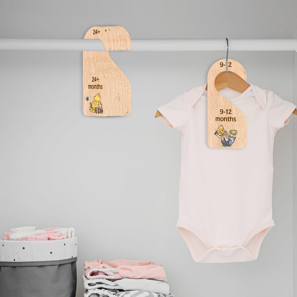 PAMBO Winnie Bear monthly baby clothes set supports growth-friendly organization.