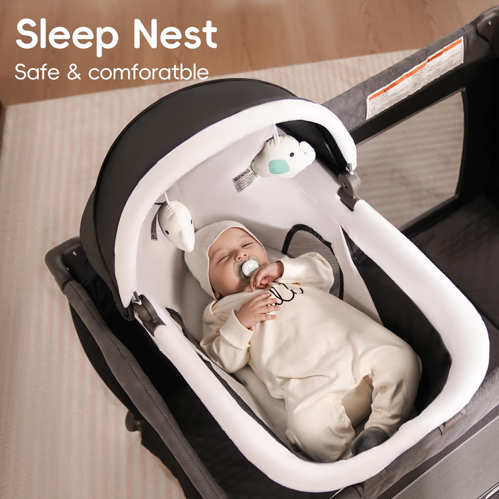 Pamo Babe Playard newborn bassinet diaper changer for quick changes