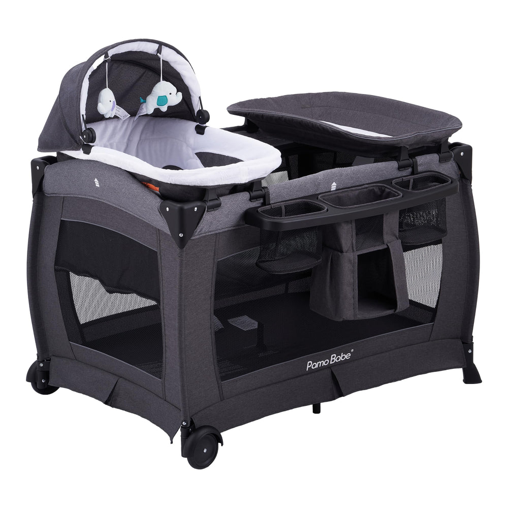 Pamo Babe portable playpen assembly shows quick setup and sturdy frame.