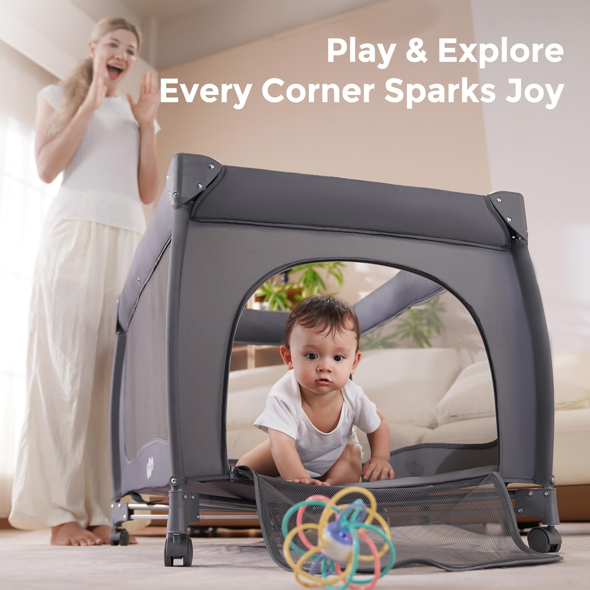 Pamo Babe Pack and Play changing table keeps diapers within reach with a waterproof surface.