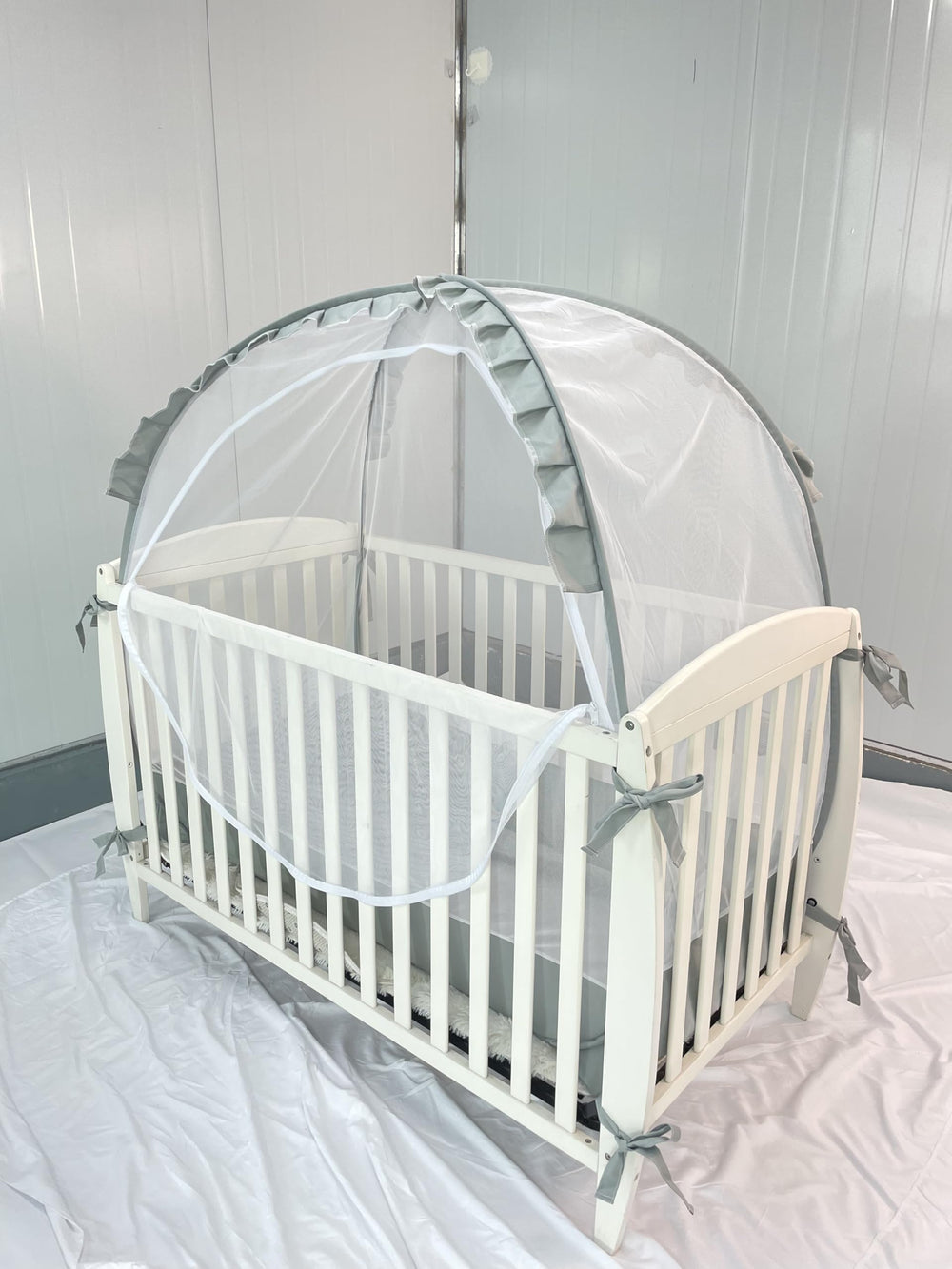 PandaEar full-coverage mesh around crib illustrating all-around protection for baby.