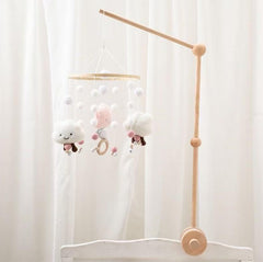 Anti-slip attachment with silicone pads ensures secure fit on most cribs.