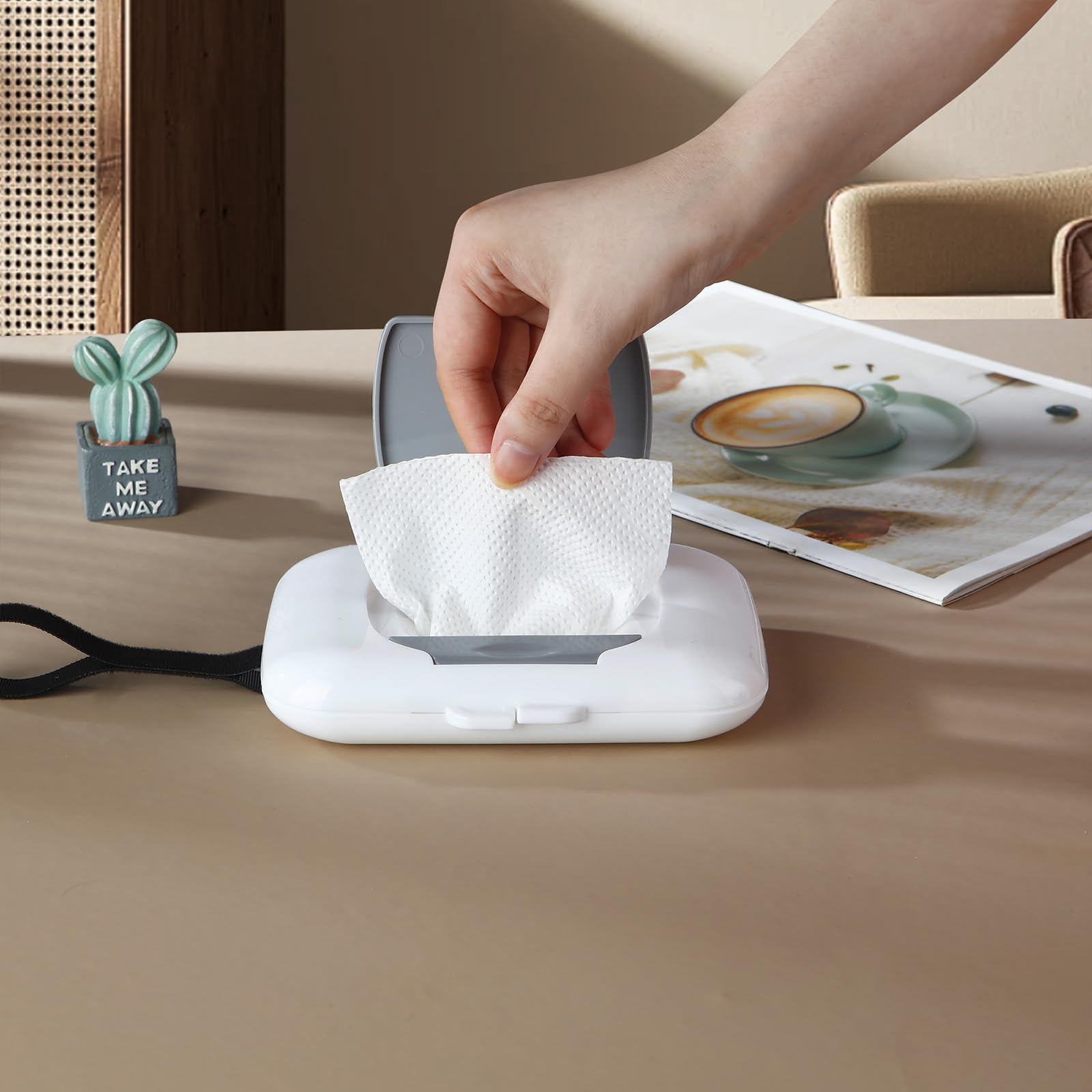 PandaEar compact wipes dispenser fits diaper bag for on-the-go changes.