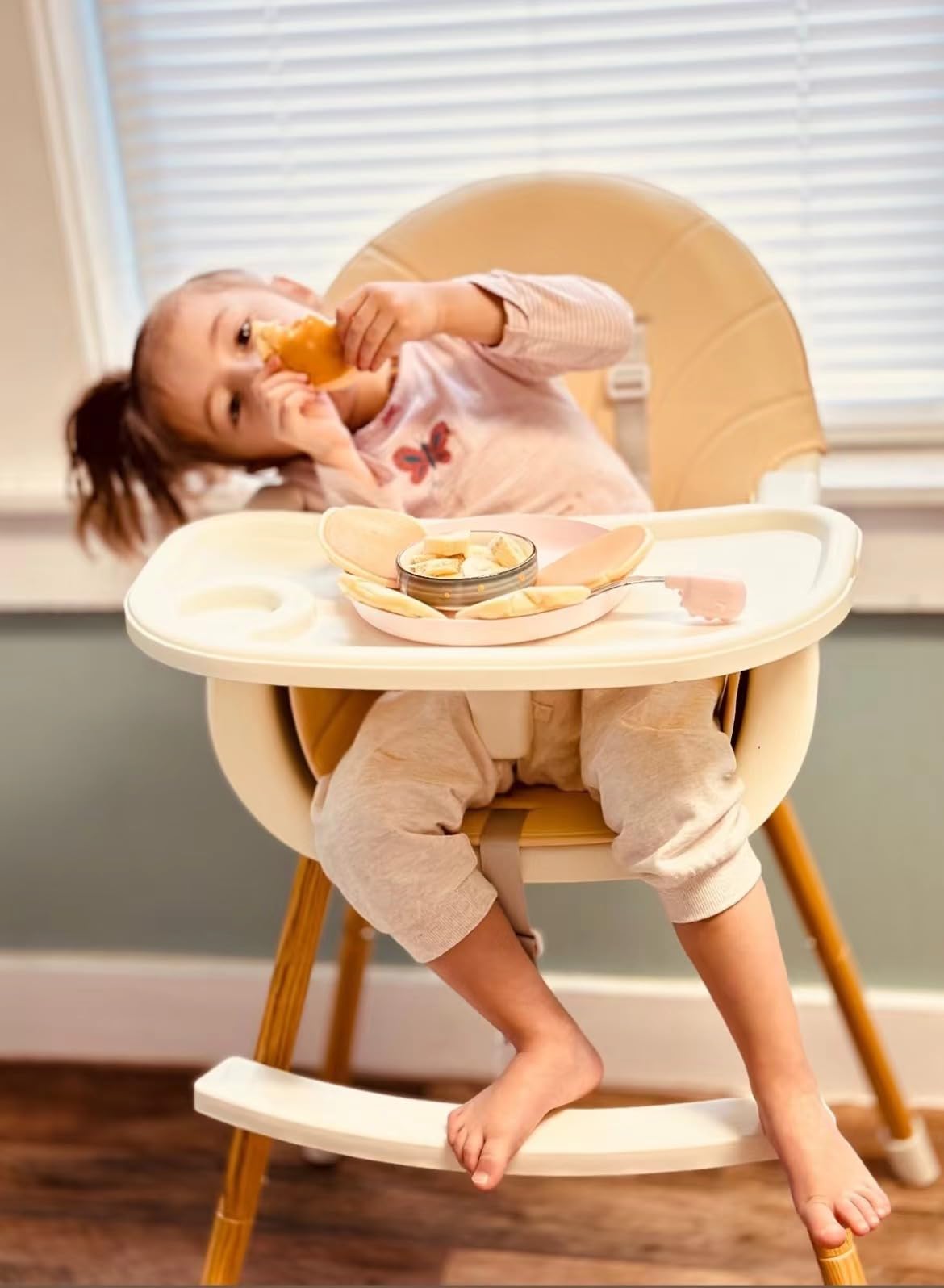PandaEar high chair converts to toddler chair for growing children.