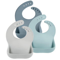 PandaEar blue silicone bib with open pocket catching crumbs during feeding