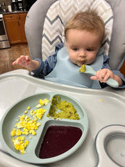 PandaEar silicone bib shown as dishwasher-safe and easy to clean