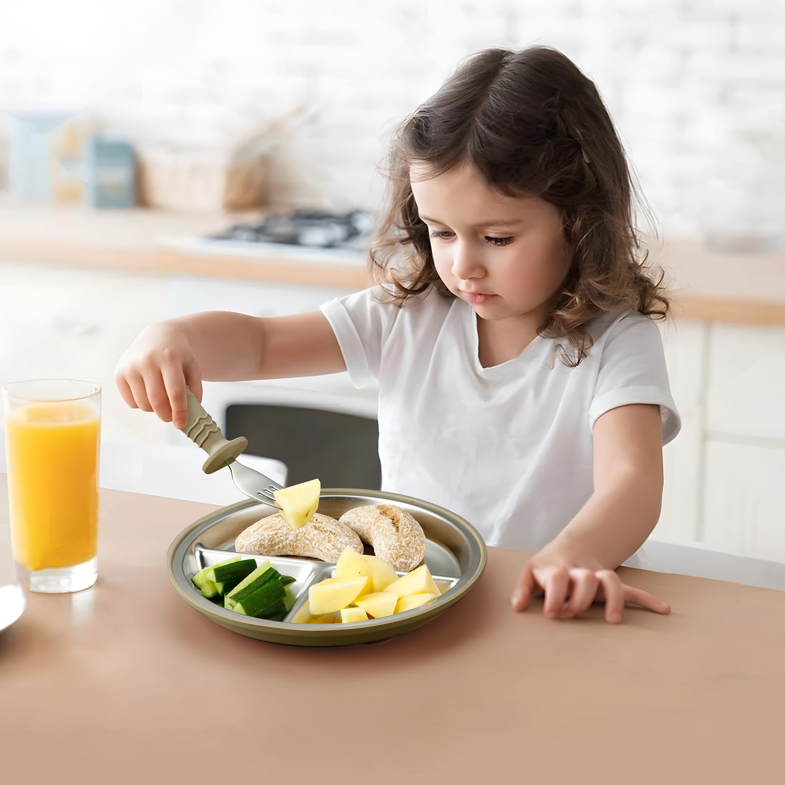 PandaEar suction plate in walnut demonstrates secure grip on highchair trays.