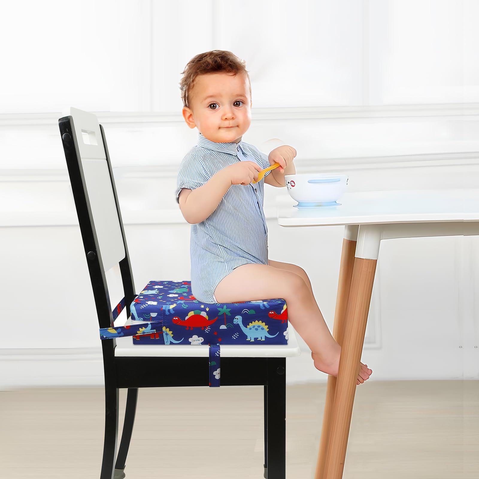 PandaEar toddler booster seat at dining table providing stable, comfortable support during meals.