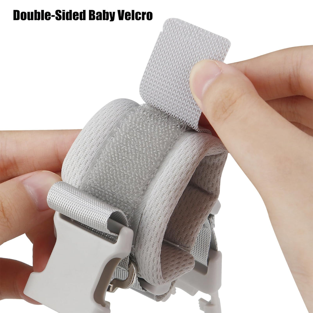 PandaEar wrist-link attached to backpack shows versatile safety in daily outings.