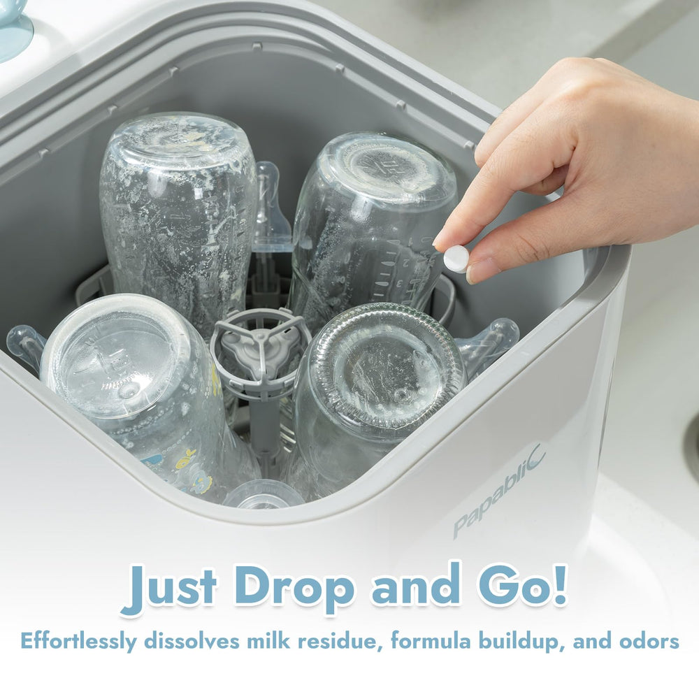 Papablic detergent tablet in sink for easy hand-washing of baby items.