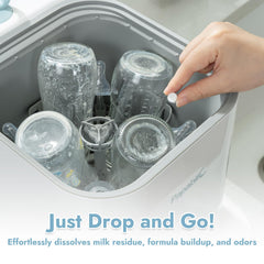 Papablic detergent tablet in sink for easy hand-washing of baby items.
